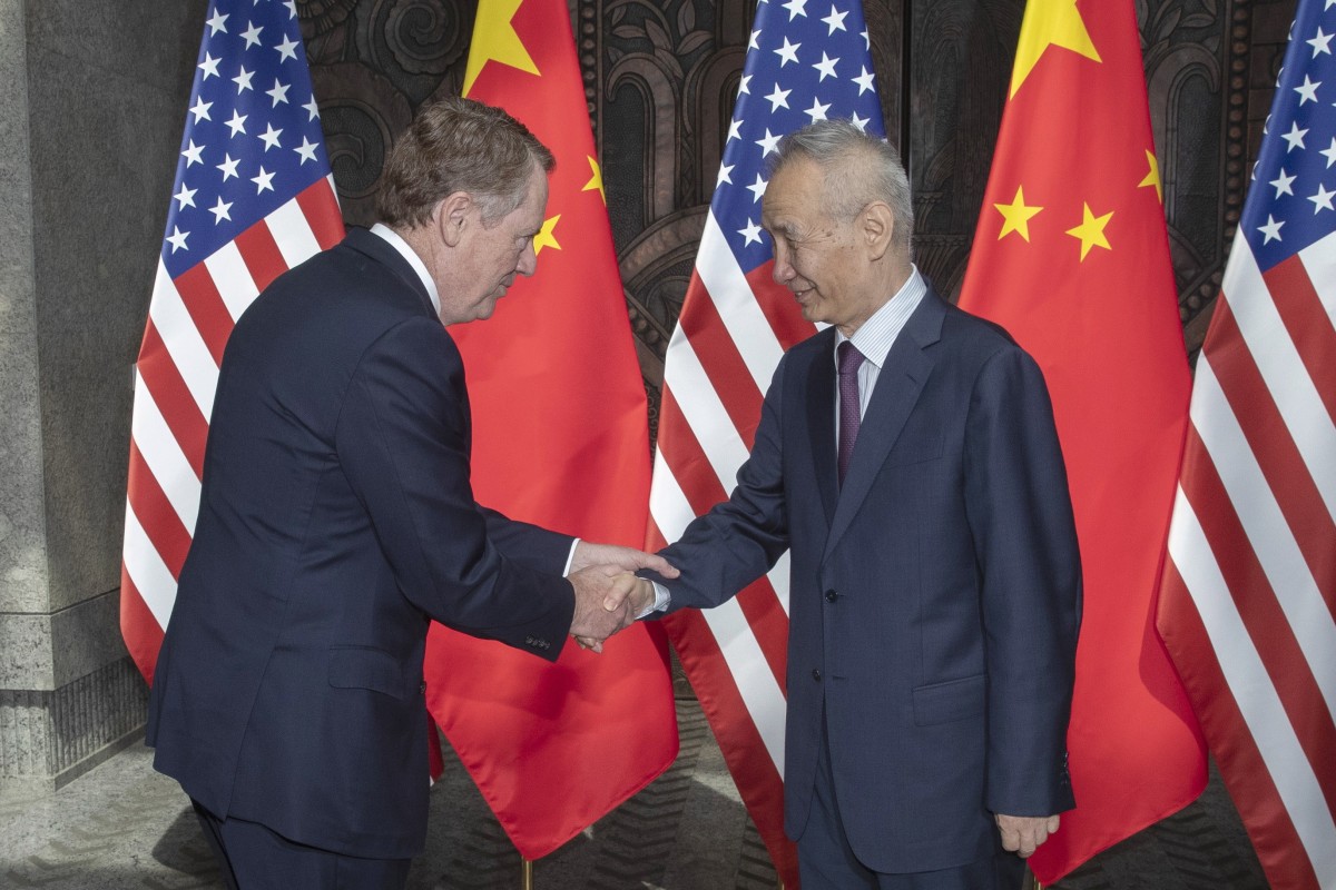 US Trade Representative Robert Lighthizer is greeted by Chinese Vice-Premier Liu He ahead of resumed trade talks in Shanghai on Wednesday. Photo: EPA-EFE