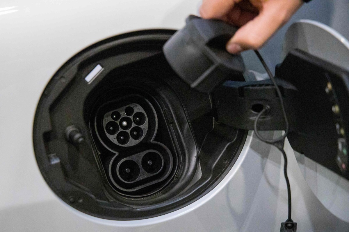 Incentives include lower taxes for manufacturers and buyers of electric cars, and benefits for EV owners, such as special parking areas. Photo: AFP