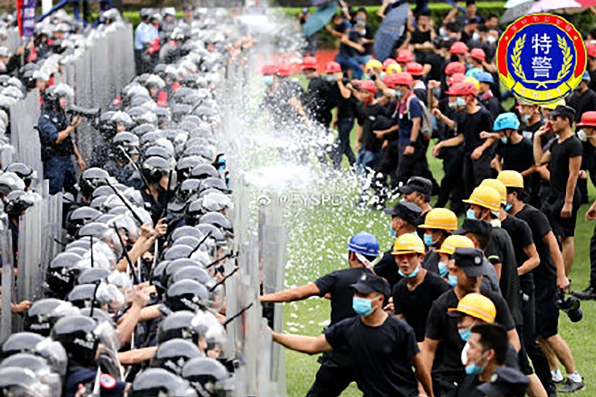 Shenzhen police broadcast live footage of a security exercise involving 12,000 officers rehearsing anti-riot drills. Photo: Weibo