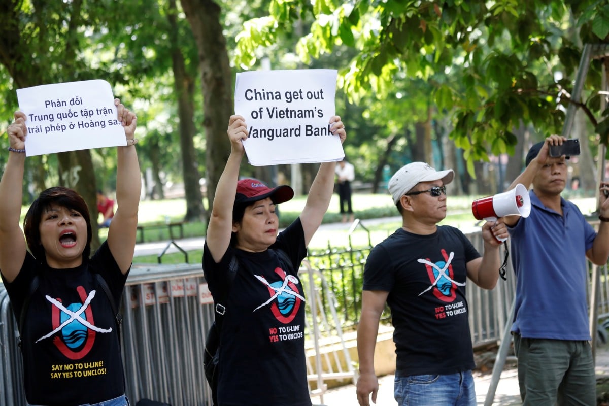Anti-China protesters in front of the Chinese embassy in Hanoi. Photo: Reuters