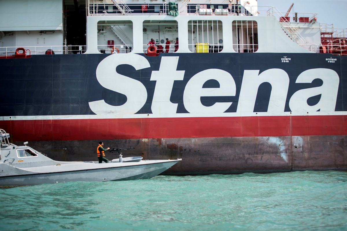 Speedboat of the Iran’s Revolutionary Guard moves around a British-flagged oil tanker, Stena Impero, in the Iranian port of Bandar Abbas two days after it was seized in the Strait of Hormuz by the Guard on Friday, July 19. File photo: Reuters