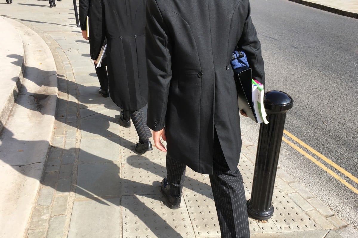 Eton schoolboys, dressed in their traditional uniform of tails, attend class. File photo: Shutterstock