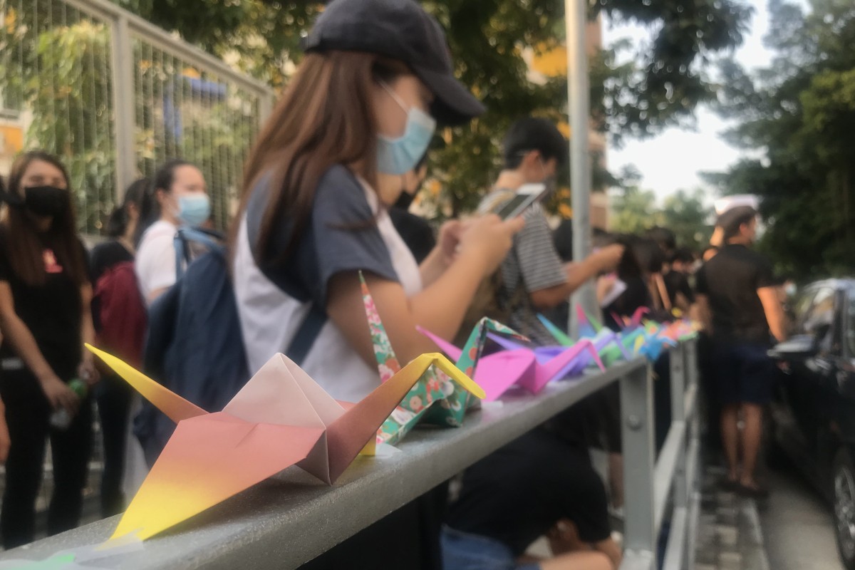 Pupils and alumni holding a sit-in near Tsuen Wan Public Ho Chuen Yiu Memorial College, chanting slogans and folding origami cranes. Photo: Kimmy Chung