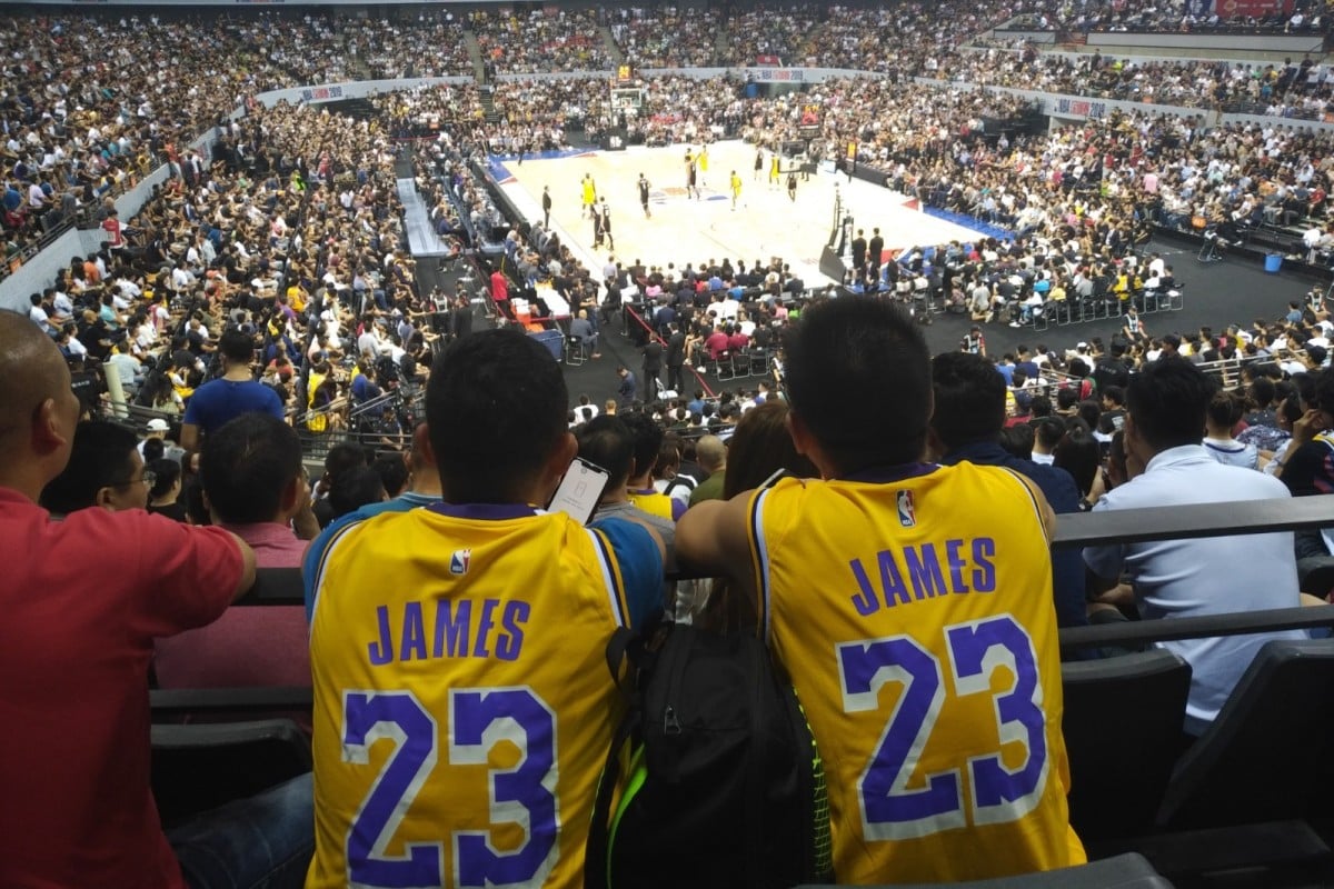 Los Angeles Lakers fans catch the game in Shenzhen on Saturday. Photo: Patrick Blennerhassett Los Angeles Lakers fans catch the game in Shenzhen on Saturday. Photo: Patrick Blennerhassett
