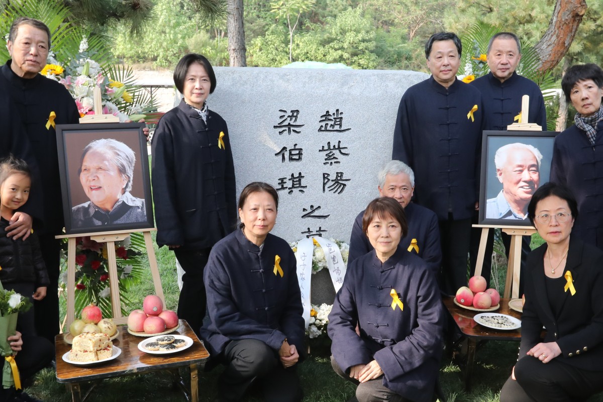 The family of Zhao Ziyang and his wife Liang Boqi pay their respects at the grave where their ashes were interred on Friday. Photo: Simon Song