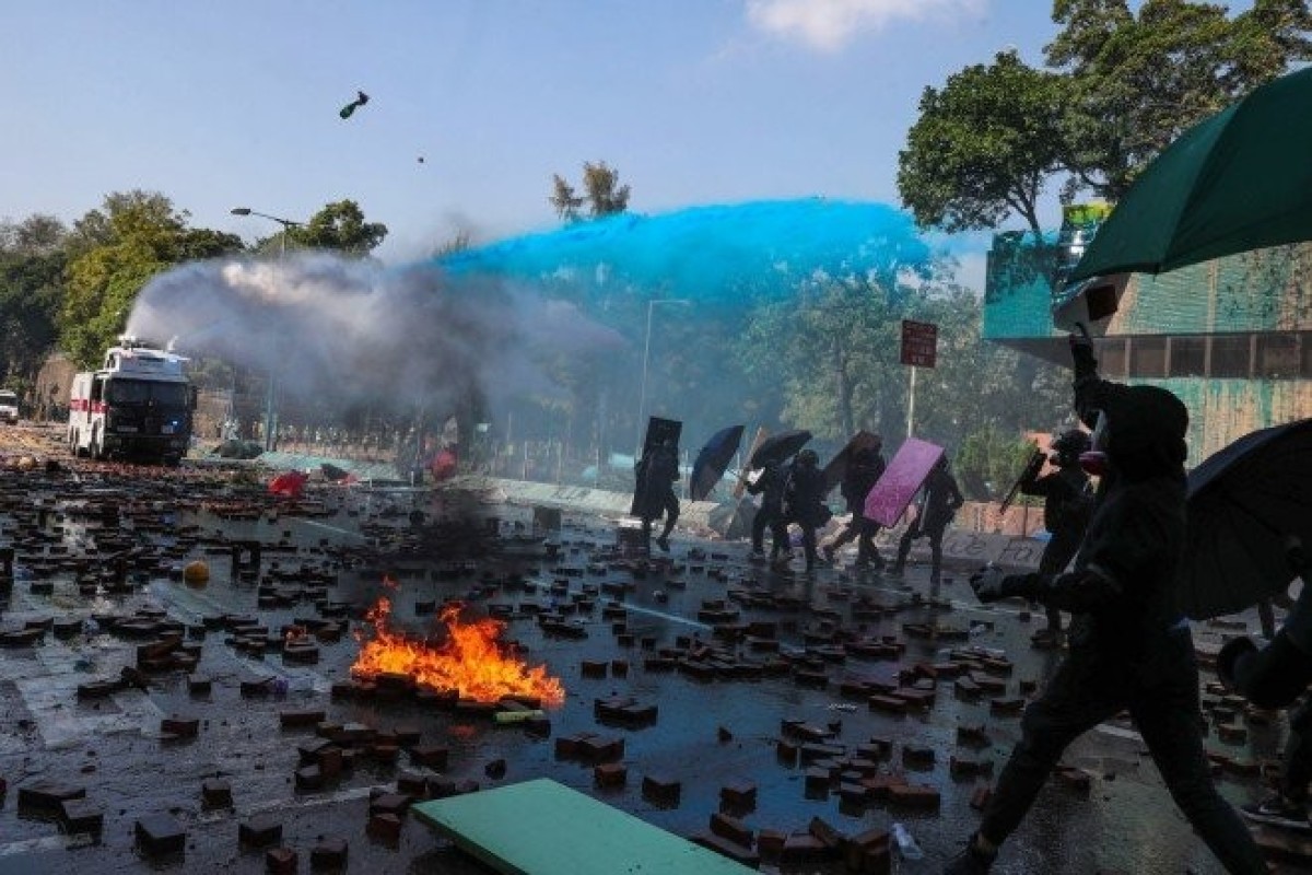 Fierce exchanges erupt between police and protesters in Hong Kong on Sunday. Photo: Handout