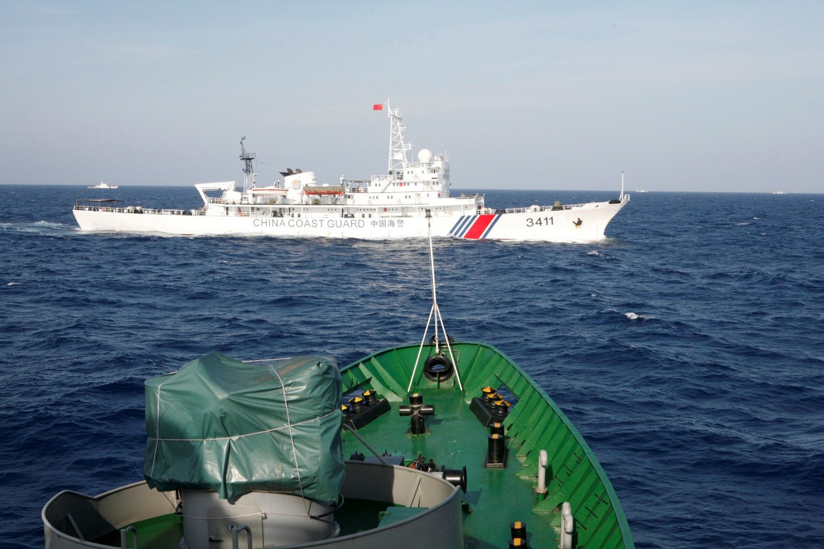 A Chinese coast guard ship photographed from a Vietnamese vessel in the South China Sea. Photo: Reuters