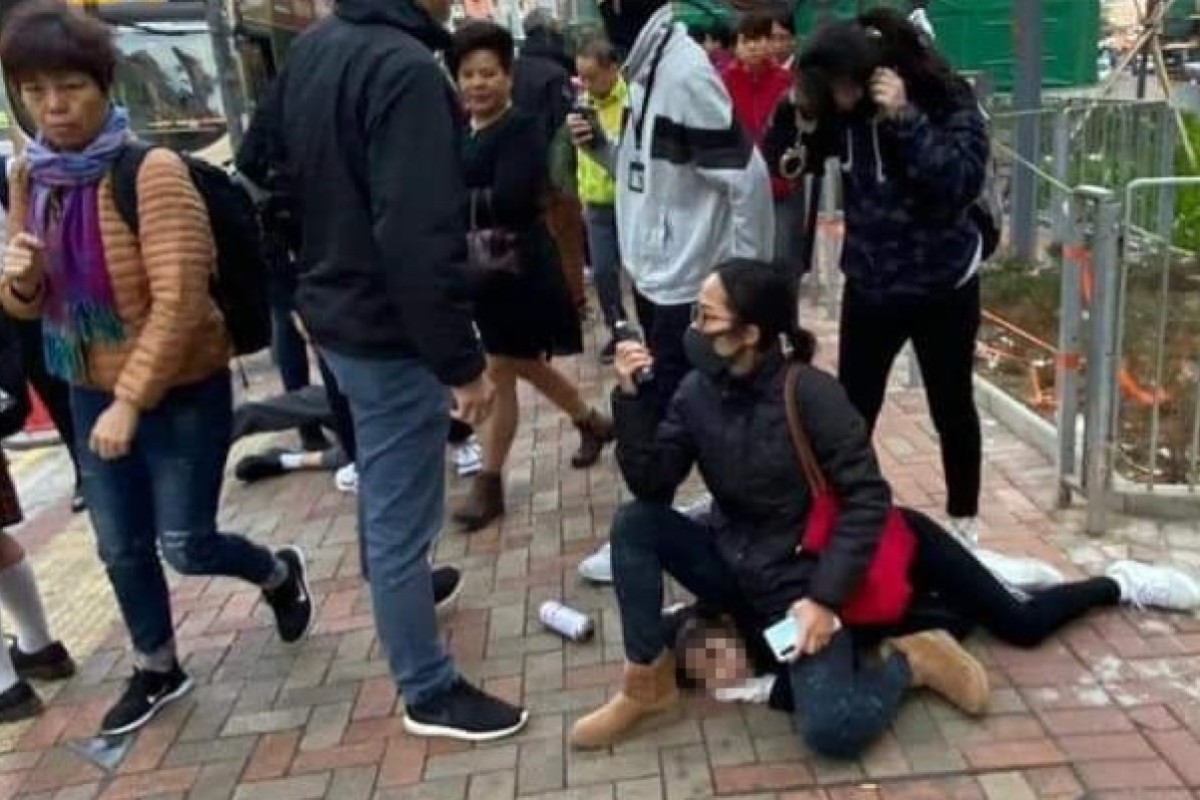 Photograph Of Hong Kong Policewoman Sitting On 14 Year Old Who Was