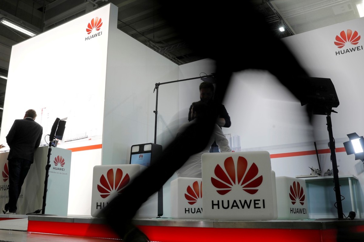 angela merkel faces revolt over huawei