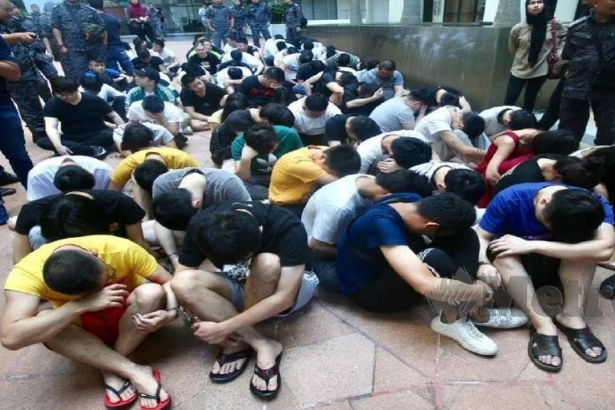 Malaysia’s Immigration Department detained 87 China nationals in a series of raids in Puchong. Photo: Facebook