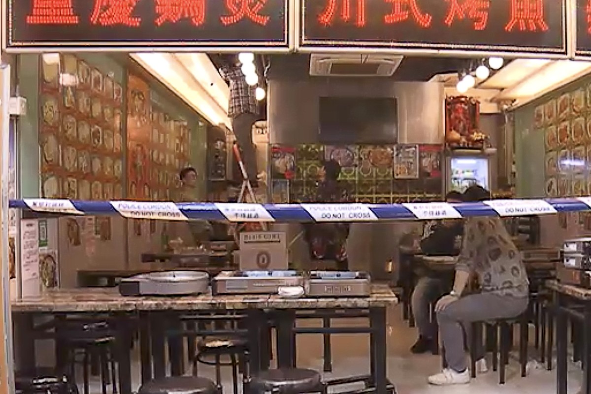 Police are looking for two masked men following a firebomb attack in Sham Shui Po. Photo: Now TV
