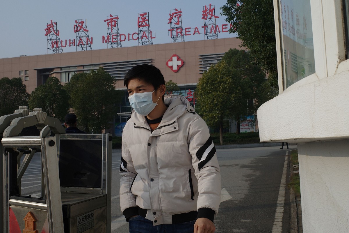 A man leaves the Wuhan Medical Treatment Centre, where some of the patients have been treated. Photo: AFP