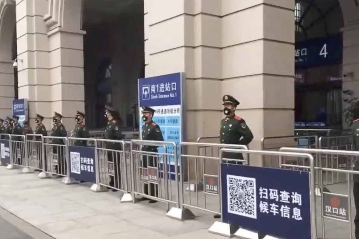 Hankou railway station in Wuhan is guarded after being closed down on Thursday. Photo: Weibo