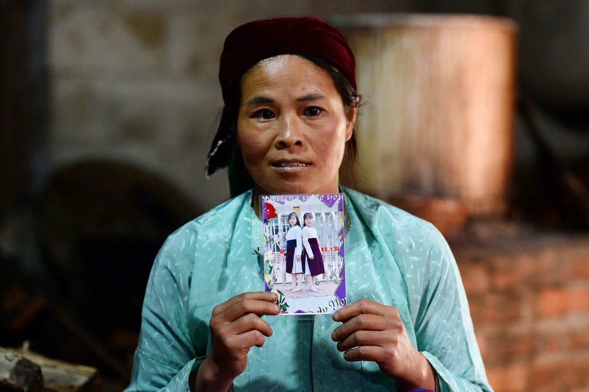 Ly Thi My is a Vietnamese mother whose daughter went missing in a mountainous border area between Vietnam's Ha Giang and China. Many in this part of Vietnam have a story about bride trafficking. Photo: AFP