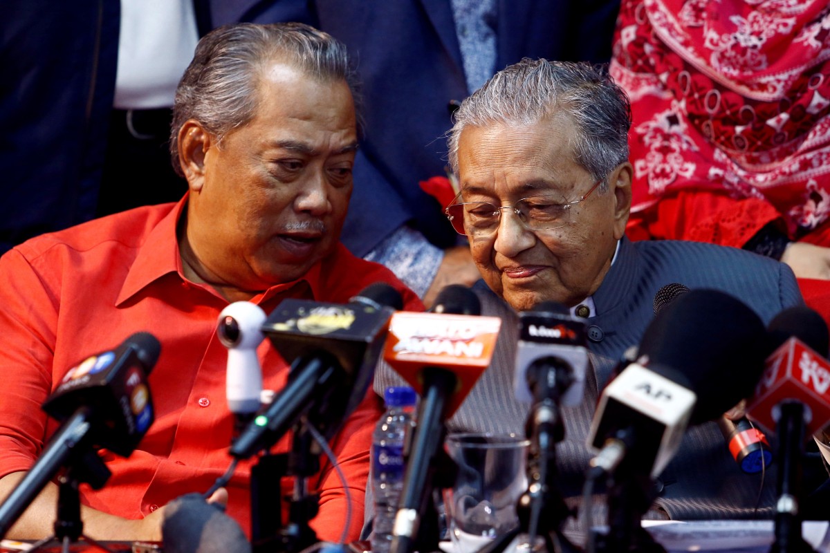 Malaysia’s then Prime Minister Mahathir Mohamad, right, pictured with his successor Muhyiddin Yassin when the two were allies in 2018. Photo: Reuters