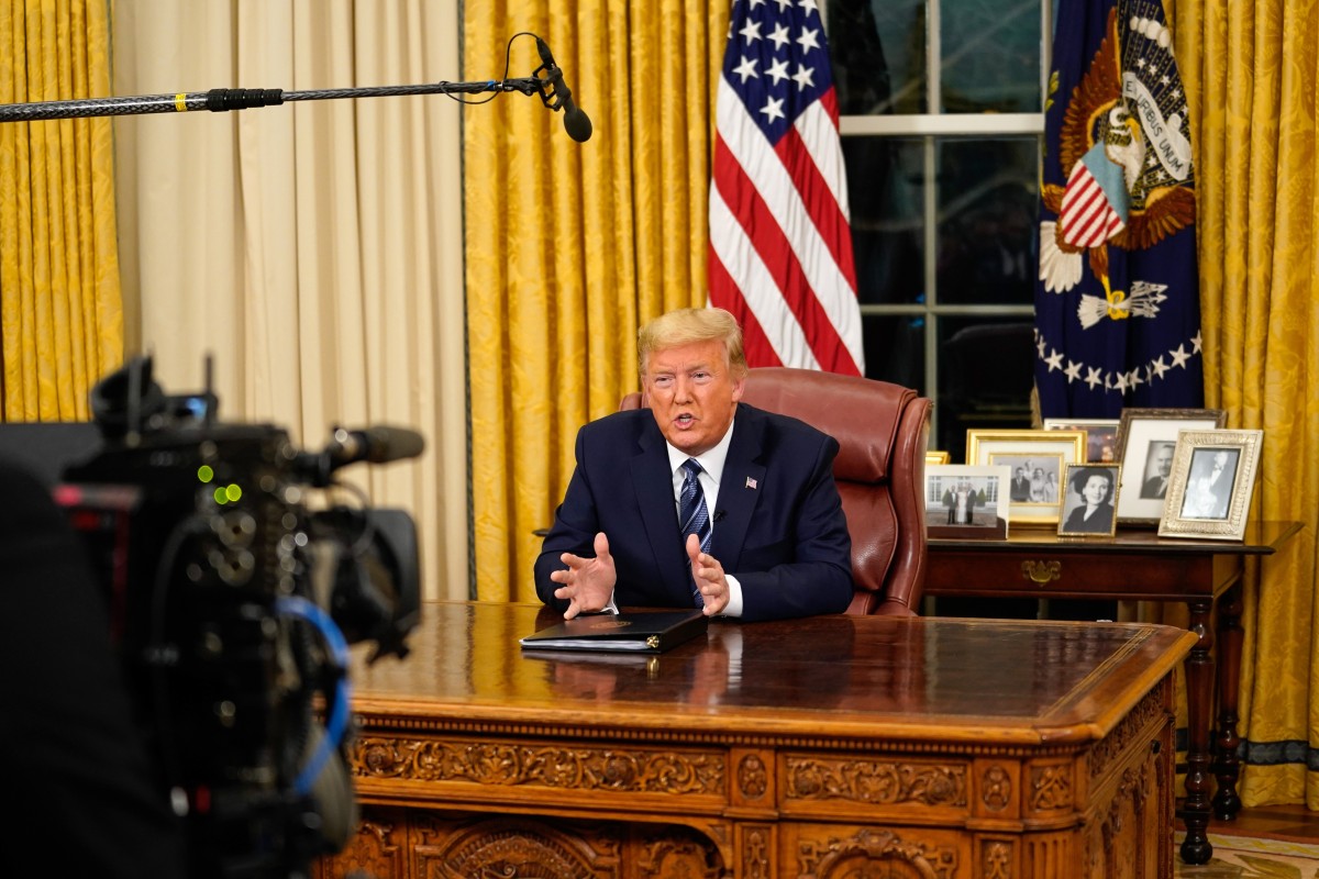 US President Donald Trump addresses the nation from the Oval Office of the White House on Wednesday night. Photo: Bloomberg