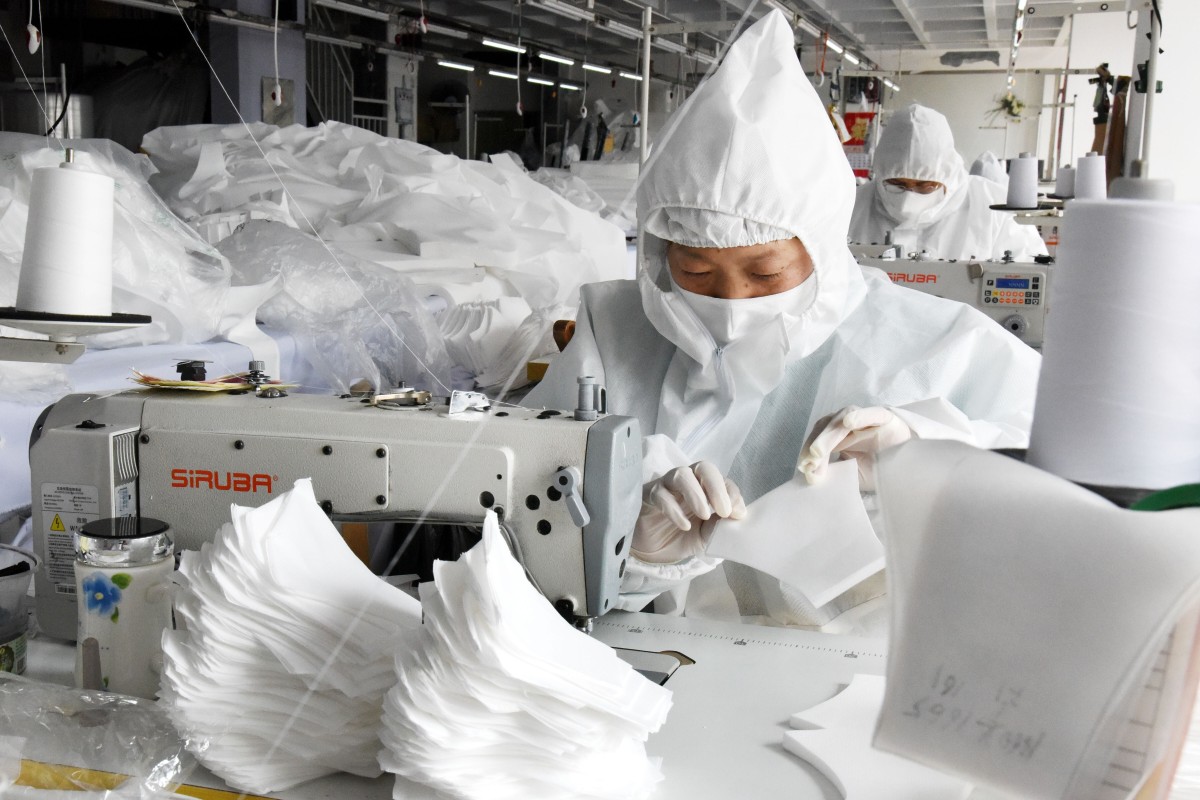Chinese factories are producing about 160 million face masks a day but some have been told they can no longer export them. Photo: Xinhua