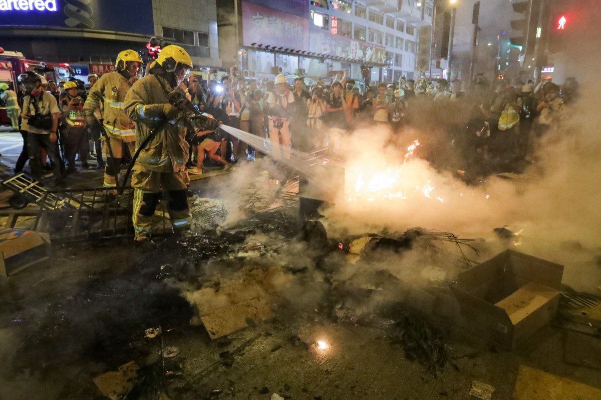 Hong Kong’s new fire chief stands by controversial comment on violent