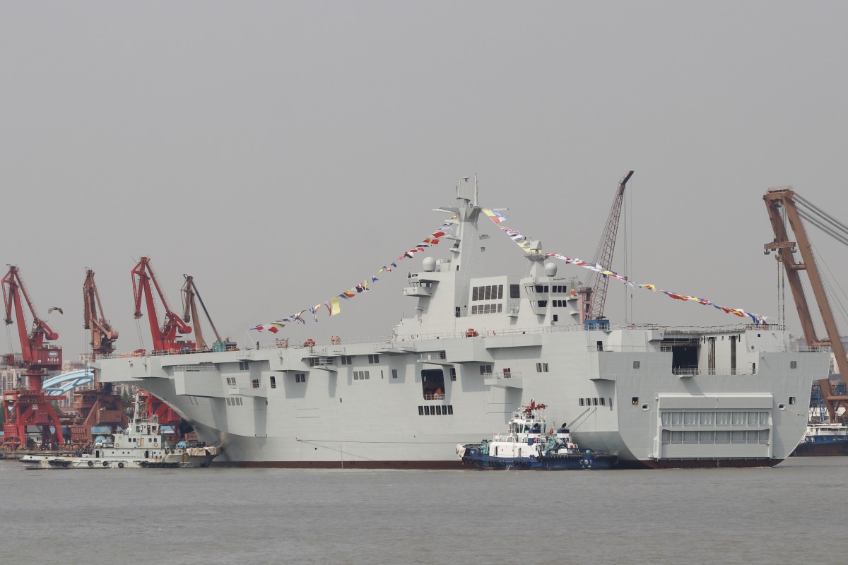 China’s second Type 075 helicopter carrier was launched on Wednesday and will now spend several months being fitted out with weapons systems and crew’s quarters. Photo: Weibo