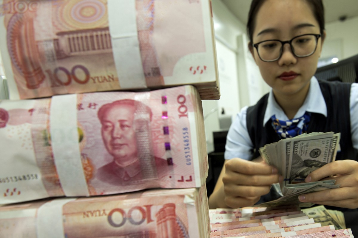 The Institute of International Finance estimated that China’s total debt hit 317 per cent of gross domestic product (GDP) in the first quarter of 2020, up from 300 per cent in the last quarter of 2019 – the largest quarterly increase on record. Photo: AP