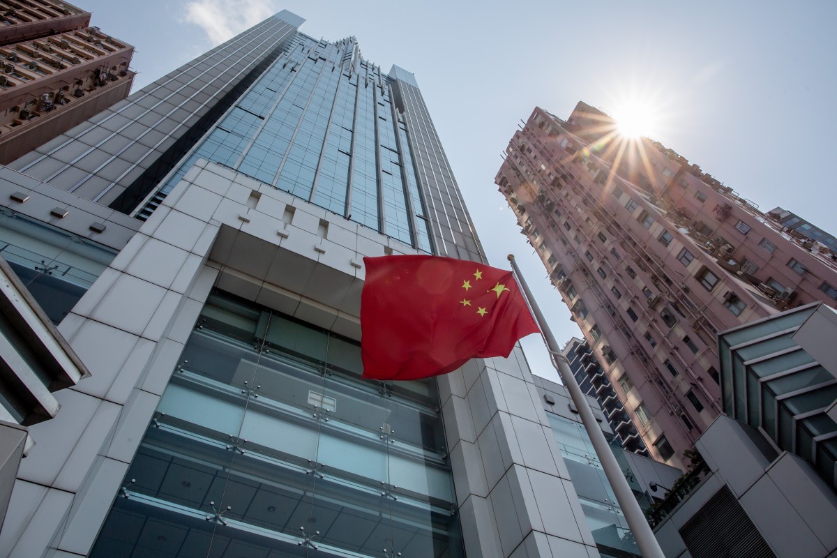 The Chinese flag flies outside the Liaison Office of the Central People's Government in the Sai Ying Pun district of Hong Kong. China is again taking steps to rein in Hong Kong's democracy advocates, drawing fresh condemnation from the US. Photo: Bloomberg