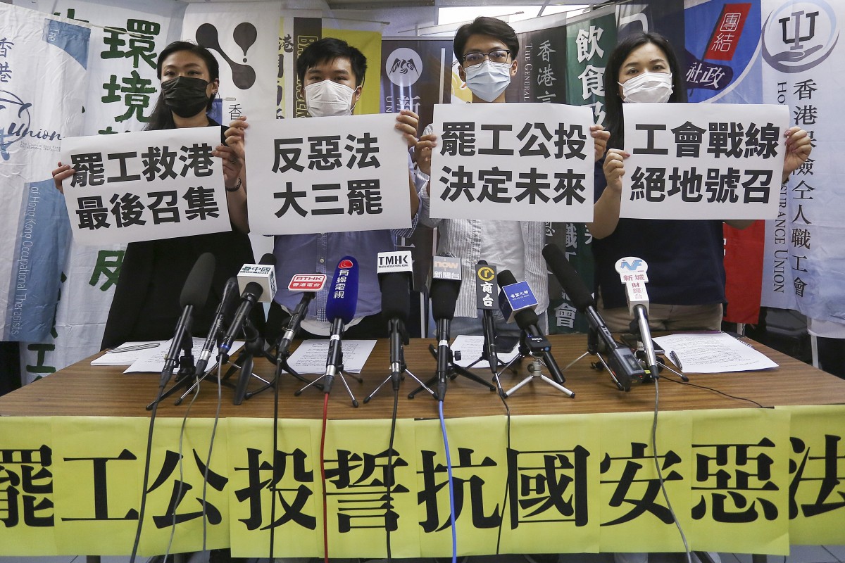 Organisers of the labour strike hold a press briefing, including (left to right) Cat Hou Chui-shan of the Bartenders & Mixologists Union; Alex Tang Cheuk-man of the Hong Kong Information Technology Workers’ Union; Alex Tsui of the Hong Kong Hotel Employees Union and Carol Ng of the Hong Kong Confederation of Trade Union. Photo: Jonathan Wong