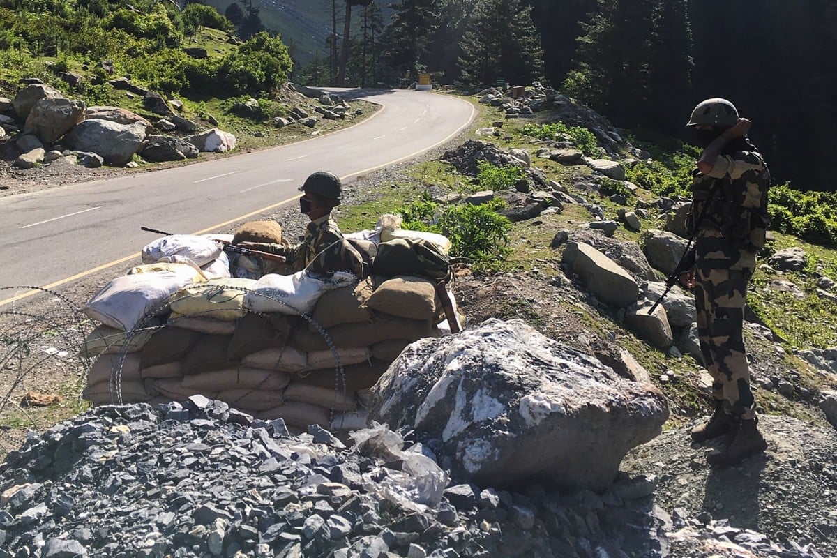 Indian Border Security Force soldiers guard a highway leading towards the Chinese border in Gagangir on June 17. Photo: AFP