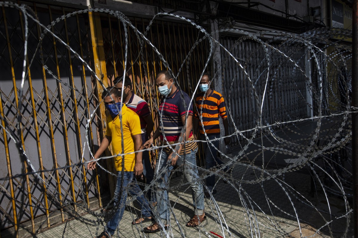 As Malaysia S Coronavirus Lockdown Lifts Migrant Workers Return