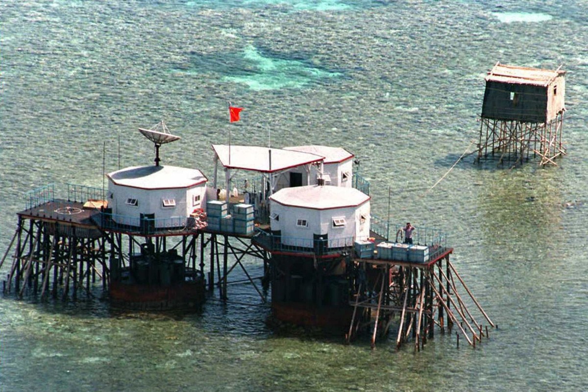 A photo from 1995 shows China’s flag flying over octagonal structures built on stilts at the Manila-claimed Mischief Reef in the disputed Spratly Islands in the South China Sea. Photo: AFP