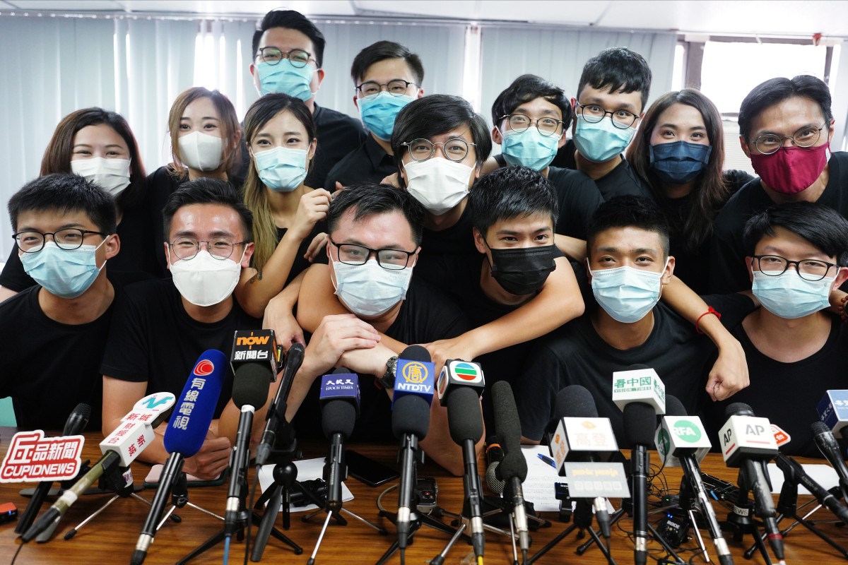 Activist Joshua Wong Chi-fung (left) with localist candidates at a press conference on the democratic primary election. Photo: Sam Tsang