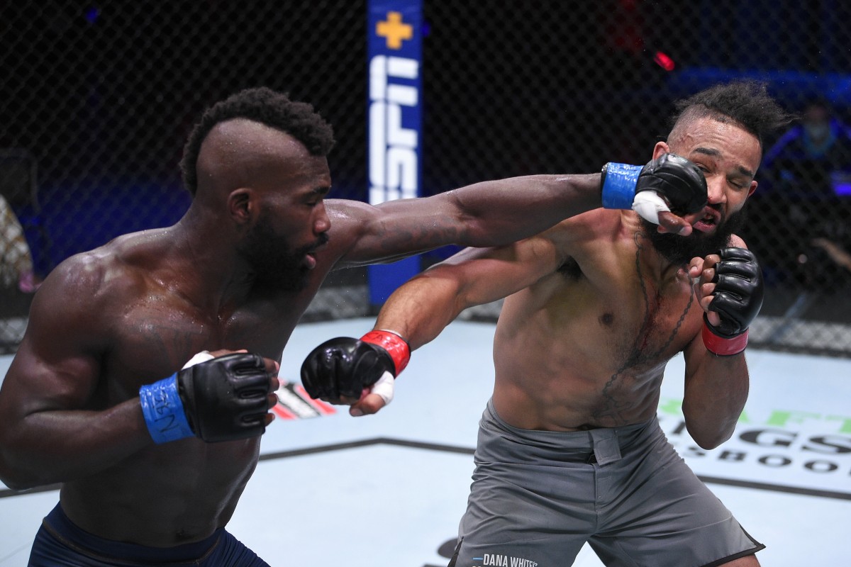 Impa Kasanganay punches Anthony Adams in a middleweight fight during week two of ‘Dana White’s Contender Series’ season four at UFC Apex in Las Vegas, Nevada. Photos: Chris Unger/DWCS LLC/Zuffa LLC