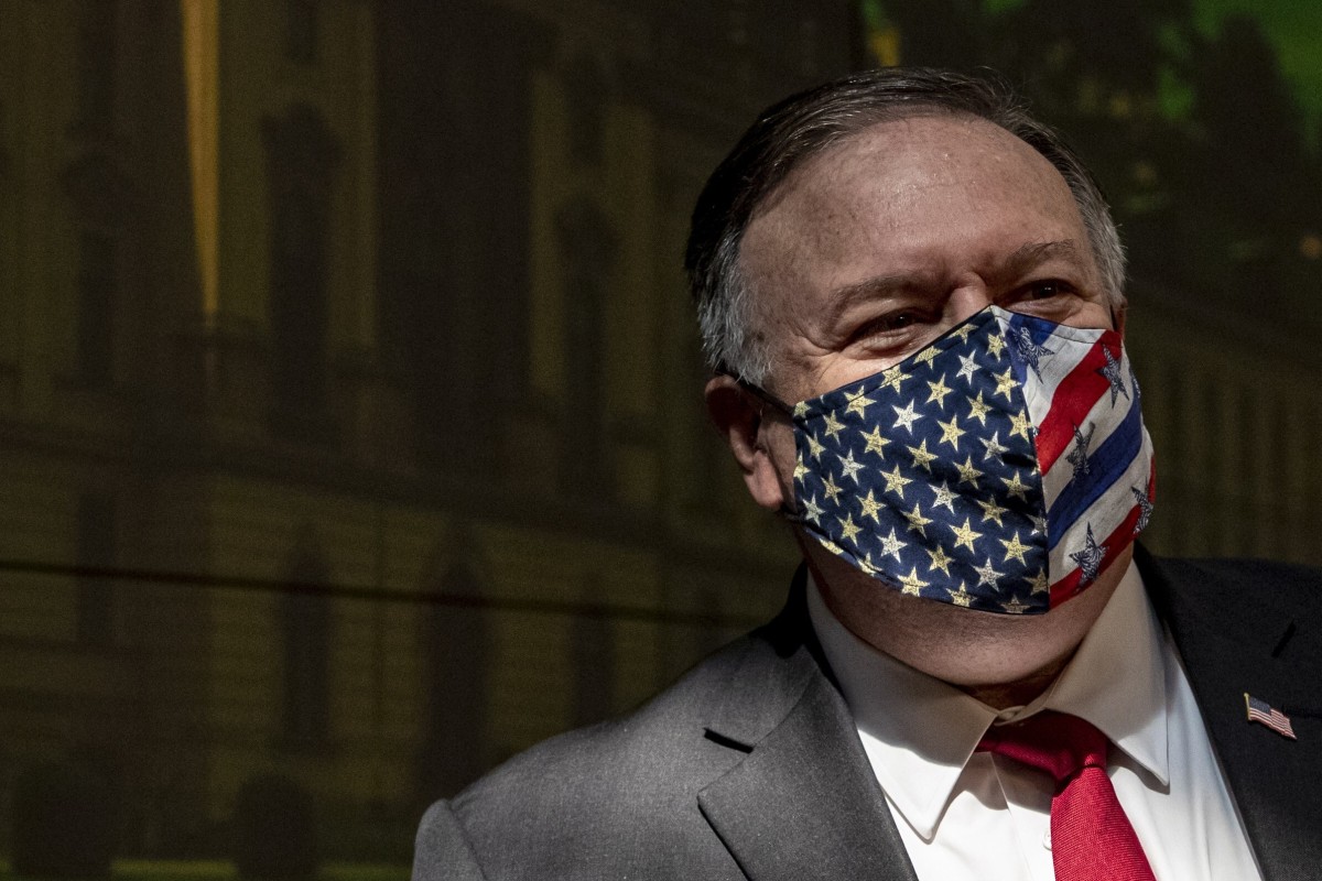US Secretary of State Mike Pompeo adjusts his face mask after a press conference in Prague on Wednesday. Photo: EPA-EFE