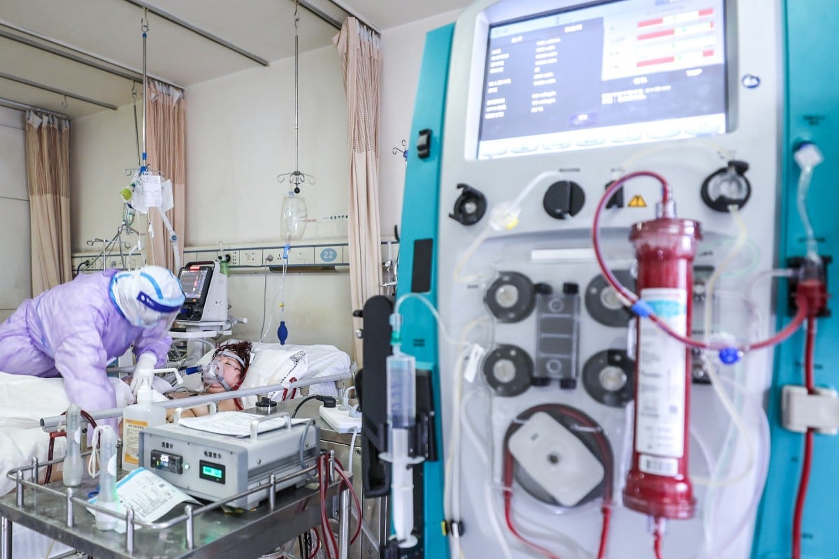 A Covid-19 patient is treated using the controversial life support system in a Chinese hospital. Photo: AFP