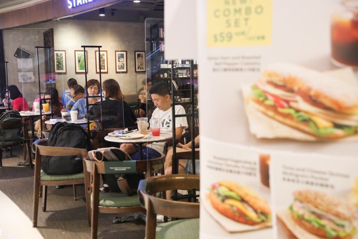 The number of people allowed to sit together at restaurants in Hong Kong will rise to four from Friday. Photo: K.Y. Cheng