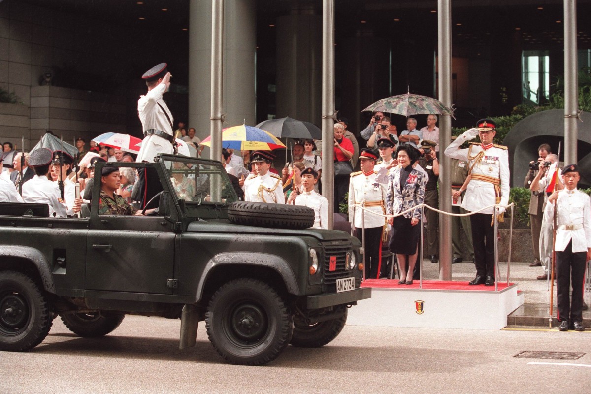The Volunteers’ final parade passes by chief secretary Anson Chan on September 2, 1995. Photo: SCMP
