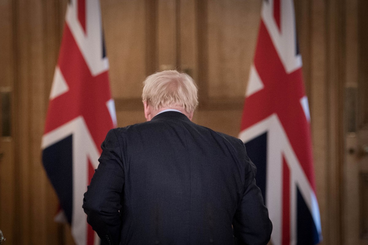 Britain's Prime Minister Boris Johnson leaves at the end of a virtual news conference at Downing Street, London, on September 9. Johnson insisted this week that he would proceed with a bill that overrides part of Britain’s EU withdrawal agreement, despite fierce criticism from EU leaders and British lawmakers. Photo: Reuters