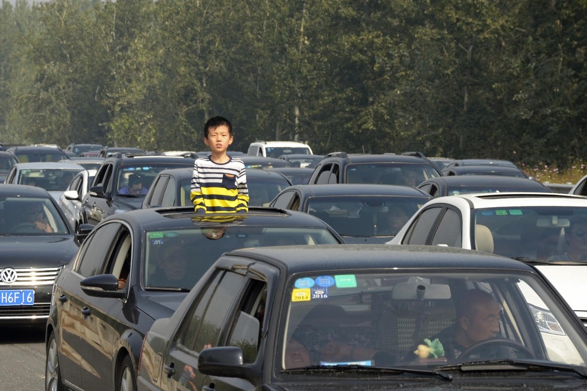 The week-long national day holiday kicks off on October 1, and ride-hailing companies are already preparing for awful traffic. Photo: Reuters