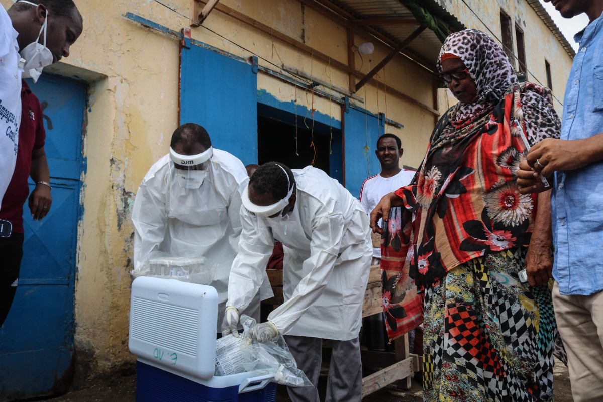Health ministry workers carry out mass testing for the coronavirus in Djibouti in May. Photo: AFP