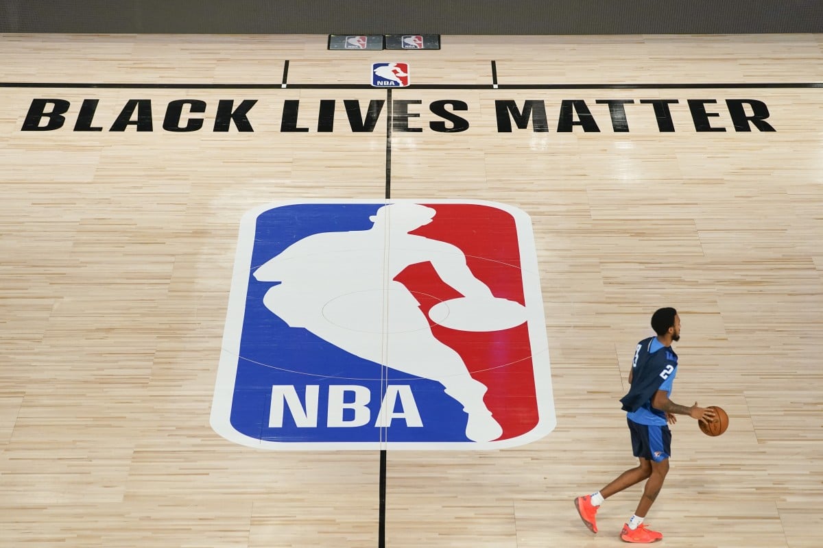 Oklahoma City Thunder's Terrance Ferguson on the NBA court with the message ‘Black Lives Matter’. Photo: AP
