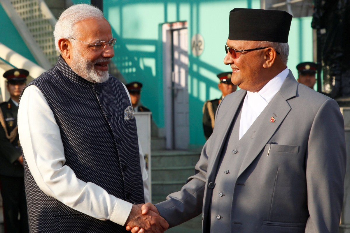 India’s Prime Minister Narendra Modi shakes hand with his Nepalese counterpart K.P. Sharma Oli in 2018. Photo: Reuters