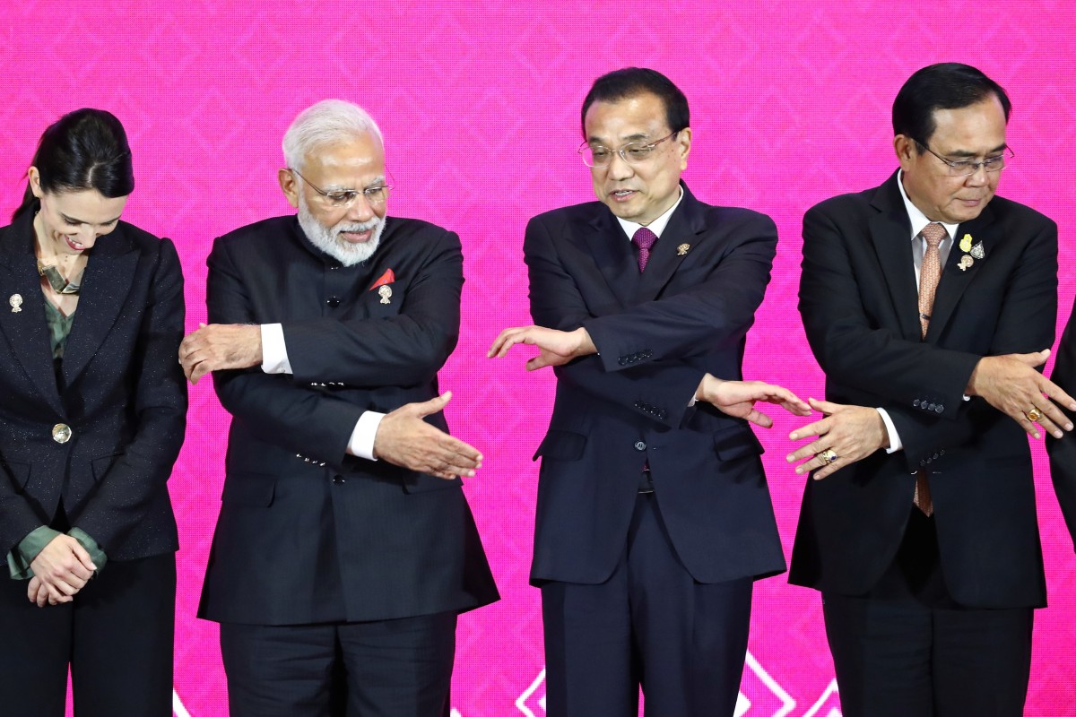 Chinese Premier Li Keqiang (second right) locks hands with other leaders at the RCEP summit in Bangkok in November last year. Photo: Reuters