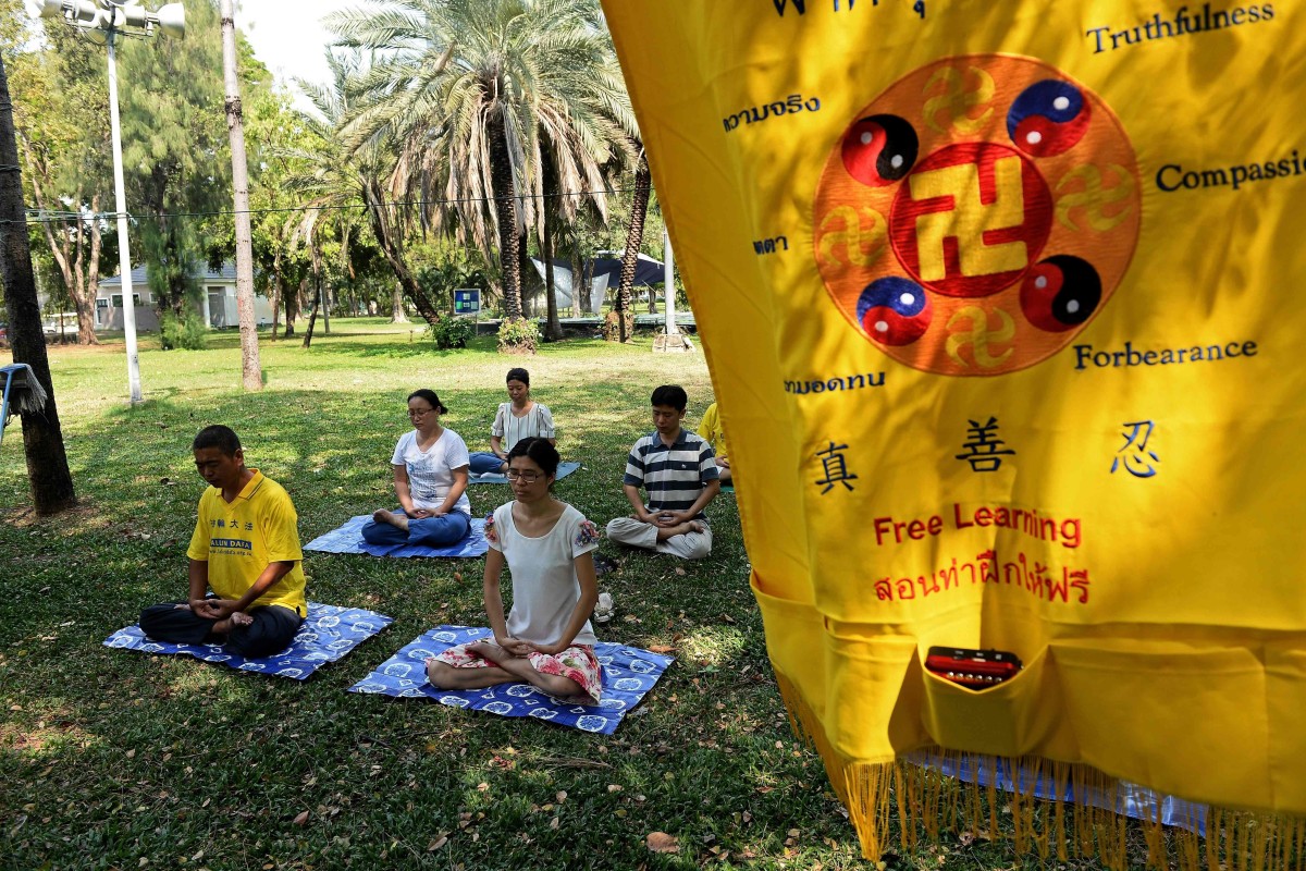 Falun Gong practitioners in Bangkok. The group has been banned in China as an “evil cult” since 1999. Photo: AFP