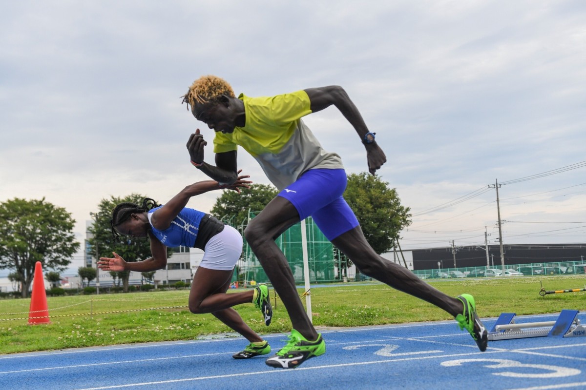 100-metre sprinter Lucia Moris, left, and 400-metre hurdle sprinter Akoon Akoon during their training in Maebashi on July 6. Photo: Noriko Hayashi/Bloomberg
