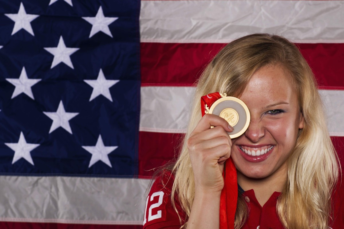 Paralympic swimmer Jessica Long holds up a gold medal as she poses for a portrait during the 2012 US Olympic Team Media Summit. Long is competing in the Tokyo 2020 Paralympic Games. Photo: Reuters