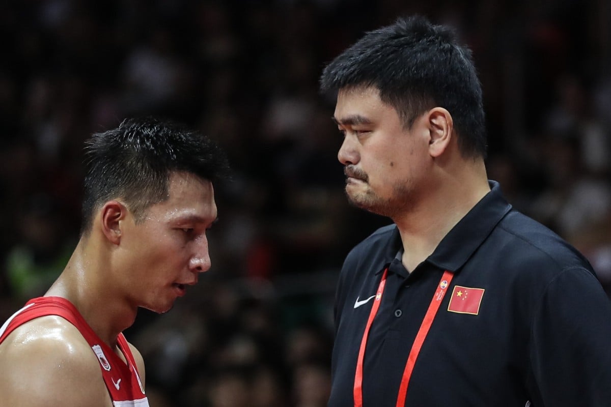 Yao Ming, chairman of the Chinese Basketball Association, and China player Yi Jianlian react during the 2019 FIBA World Cup match between China and Nigeria. Photo: Xinhua