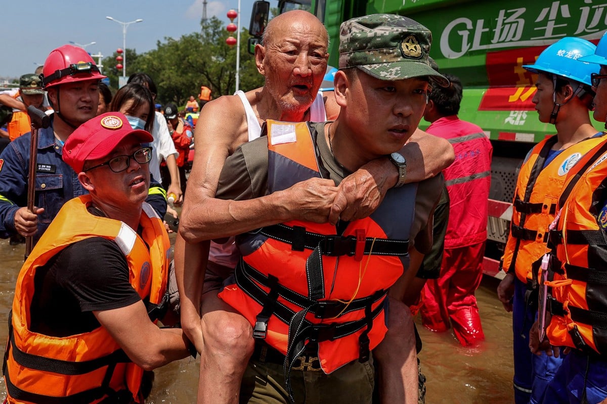 China flood death toll triples