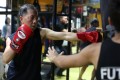 Parkinson’s patient Jimmy Wong learning Muay Thai at the Fu Tak Gymnasium in Mong Kok, part of a programme designed specifically for Parkinson’s sufferers. Photo: Xiaomei Chen