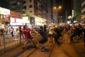 Suspected triad members attack anti-government protesters in North Point on August 5. Photo: Sam Tsang