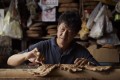 Albert Tay’s business of making giant joss sticks by hand is a vanishing trade. Photo: Tay Guan Heng