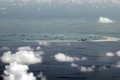 Japan’s diplomatic note made reference to China’s protests against the overflight of Japanese aircraft at Mischief Reef. Photo: AP